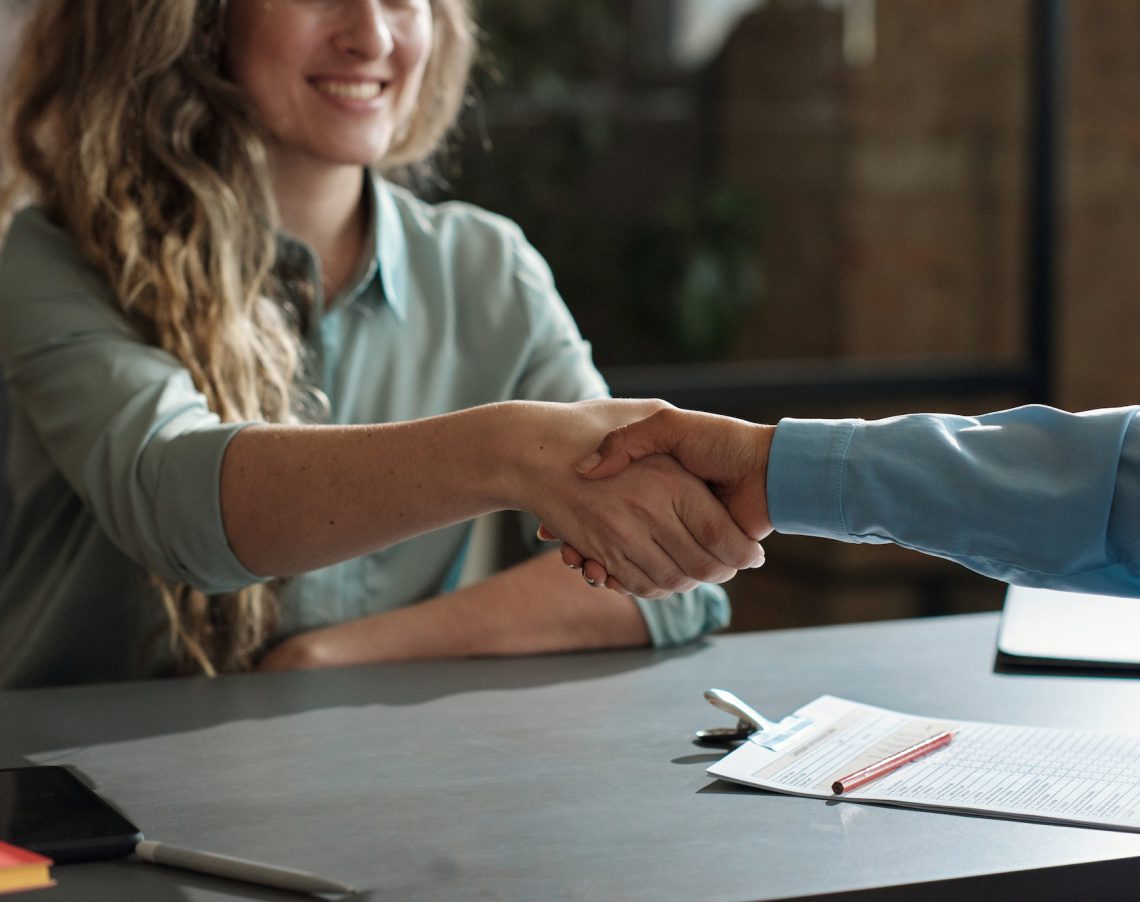 Happy woman being hired for a new job Happy woman being hired for a new job